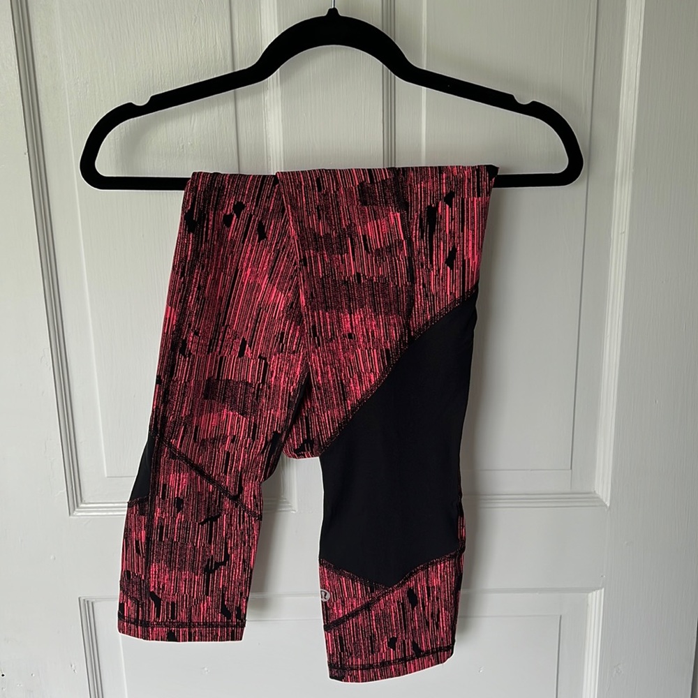 23” coral pink and black Lululemon leggings